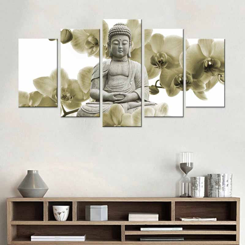 Buddha Sculpture with White Orchid