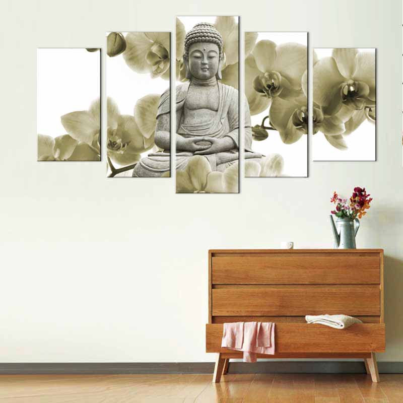 Buddha Sculpture with White Orchid